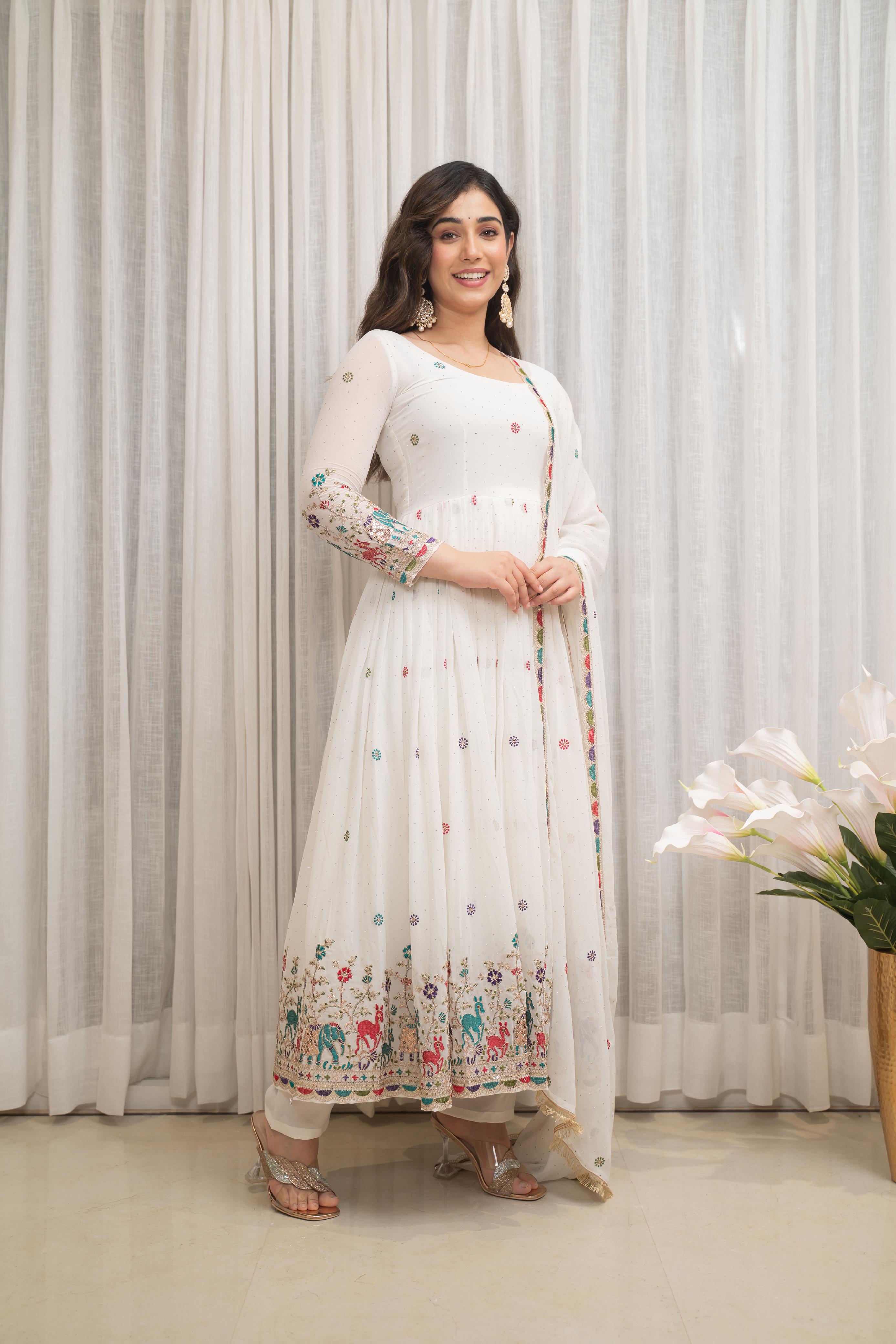 Featuring Beautiful Suit Sets in pure Russian Silk Suit Set Top pent with duppta with jcard wiving, it is beautifully decorated desgins prints and hand zari wiving Jequard