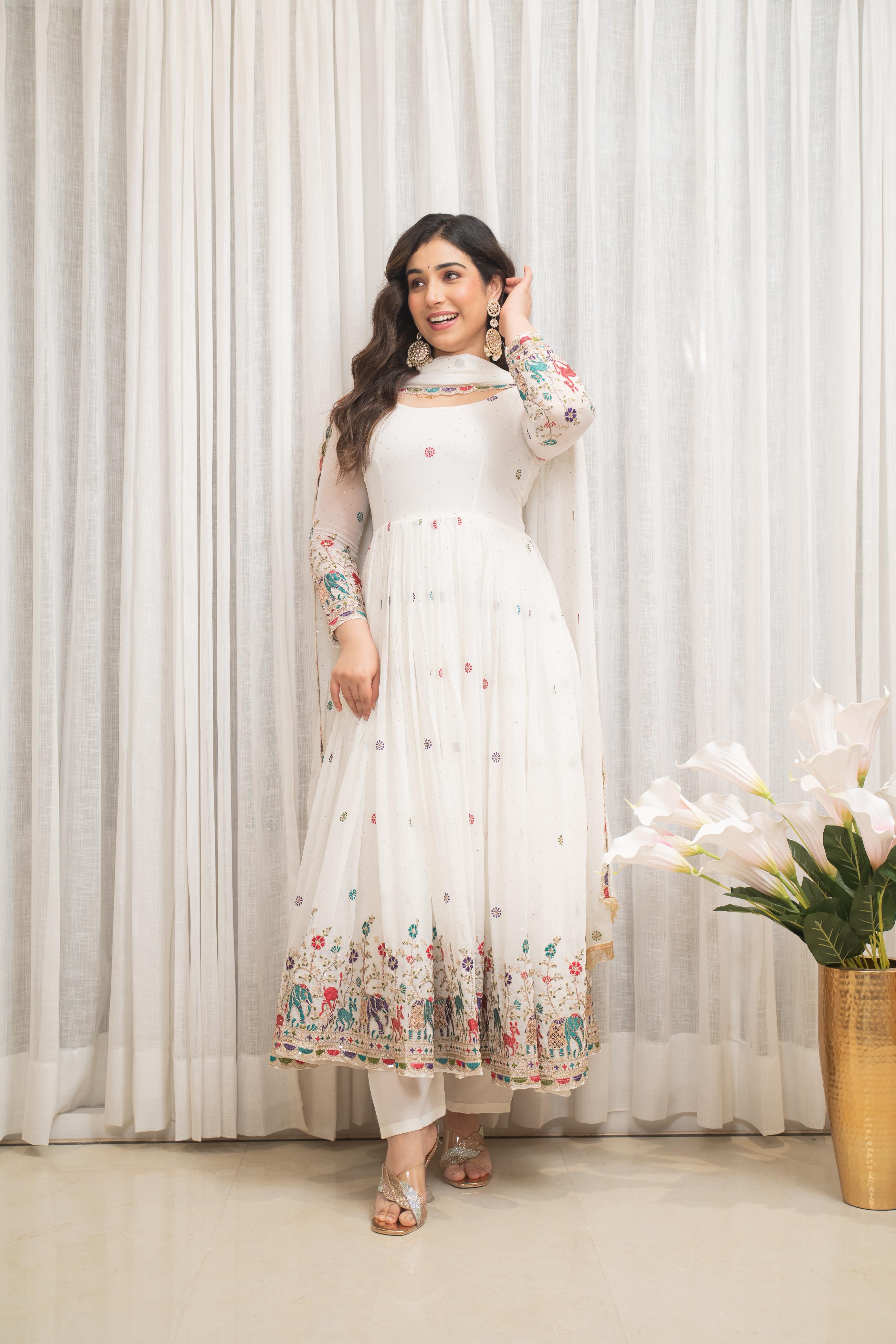 Featuring Beautiful Suit Sets in pure Russian Silk Suit Set Top pent with duppta with jcard wiving, it is beautifully decorated desgins prints and hand zari wiving Jequard